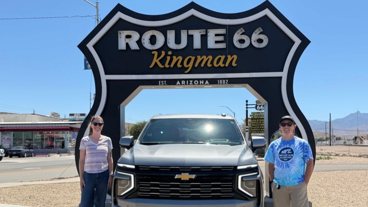 Chevrolet Tahoe under the Route 66 arch in Kingman, Arizona